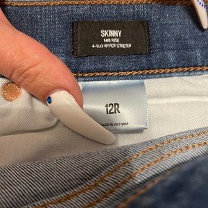 Like new Express Mid Rise skinny jeans